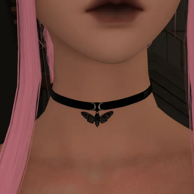 A witchy cicada and crescent moon adorned choker